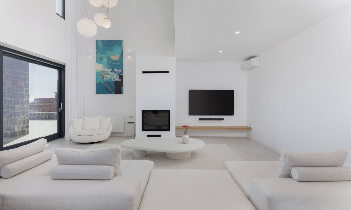 Santorini Villa | A luxurious Santorini villa set in a vineyard, with pool and stunning views.