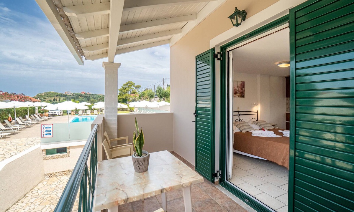 Arillas Apartment | Apartment 'Standard Studio Upstairs 11' with Shared Pool, Wi-Fi and Air Conditioning