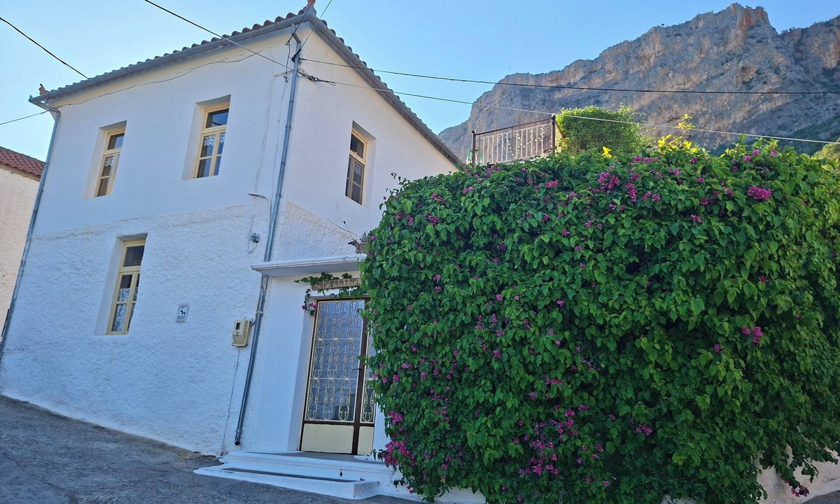 Leonidio House | At the foot of the red cliff.