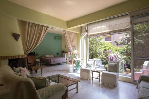 Argyroupoli Apartment | Charming Sunlit Apartment with Garden Views