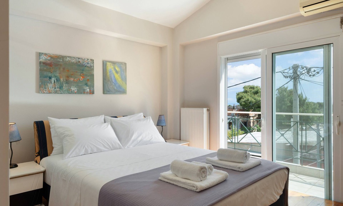 Spata-Artemida Apartment | First Floor Bedroom 3 with Shared Terrace, Wi-Fi, and Air Conditioning