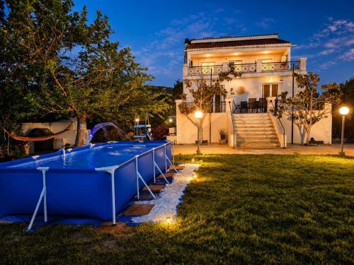 Marathon Villa | Luxury 6BR Villa, Garden Oasis, near Schinia Beach