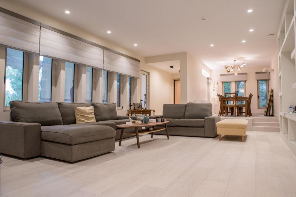 Vouliagmeni Apartment | THALIA, luxury 3Br Home with Ensuite Bathrooms, just 3 minutes walk from the beach located in the prestigious Athenian Riviera