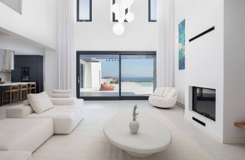 Santorini Villa | A luxurious Santorini villa set in a vineyard, with pool and stunning views.