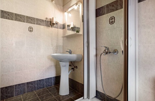 Limni Keri Apartment | Apartment "Dolphin Apartment Sea View 9" with Private Balcony, Shared Garden & Wi-Fi