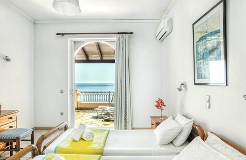Agios Georgios Pagon Apartment | Apartment for 3 people - with a beautiful sea view just 50m from the beautiful sandy beach