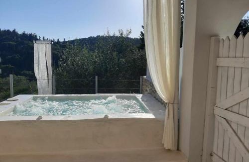 Ieromonachos Apartment | Bask in the Beauty of Paxoi - Kirki's Summer Retreats with Private Jacuzzis