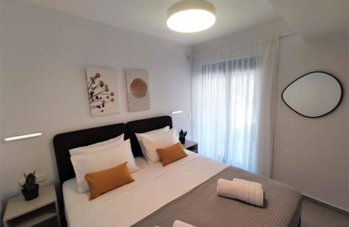 Rethymno Apartment | Brand new condo next to the beach, peaceful square, garden view