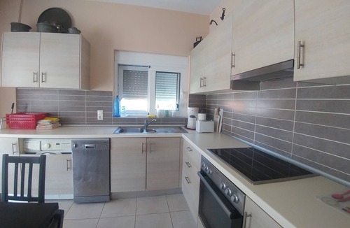 Evrostina House | Christina Apartment, a beautiful 70 m² apartment with a balcony, located 50 m from the beach