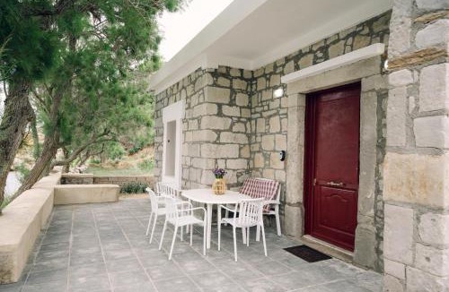 Emporios Apartment | Emporios 1930, Seafront stone house