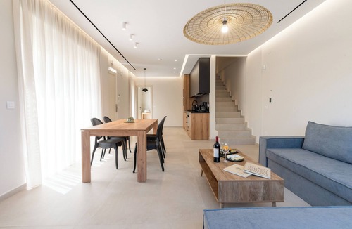 Agios Dimitrios Apartment | Enjoy a comfortable and luxurious stay.