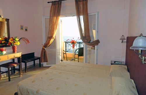 Benitses Apartment | Galini Sea Apartment 3 at the Beach with Wi-Fi, A/C & Garden