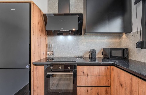 Gouves Ski Chalet | Little Rosy ,Stylish Mezzanine Retreat with Jacuzzi