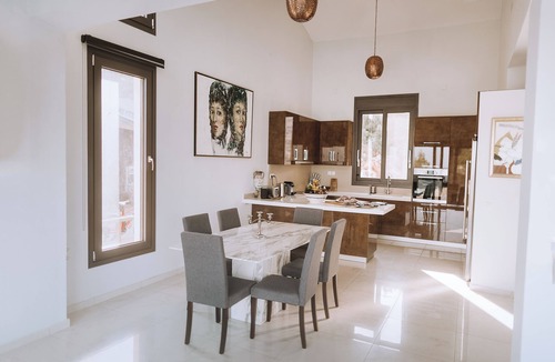 Elounda Villa | luxury villa in front of a historic famous island