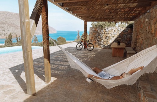 Elounda Villa | luxury villa in front of a historic famous island