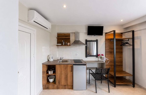 Lefkimmi Condo | Nikos Villas - Poolside Escape in Kavos, Corfu