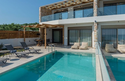 Psarou Villa | R 895 Beach Villa with Private Pool and Sea view BBQ Area Walking distance to the Beach.