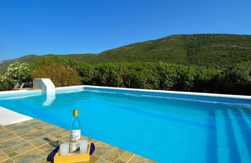 Samos Town House | "Rote Villa" by Interhome