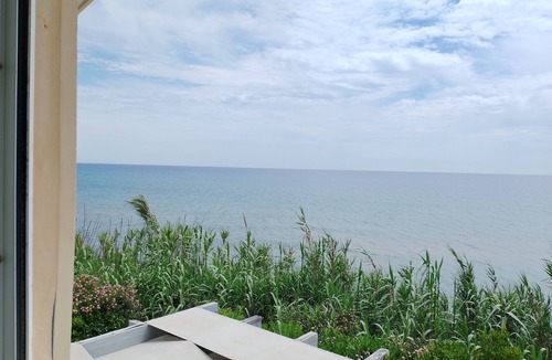 Ag. Georgios House | Seafront Loft 'Myrto' with Sea View, Private Terrace and Air Conditioning