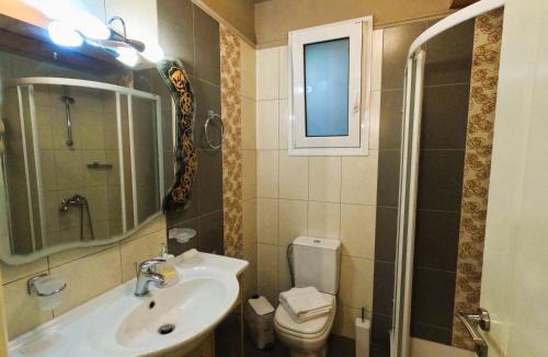 Loutraki Apartment | Stylish 2BR Semi-Basement- Cozy & Family-Friendly Retreat