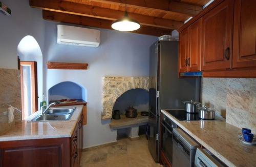 Symi Villa | Symi Uptown Indigo Villa-Indulge in a restored Symi villa and its secret garden
