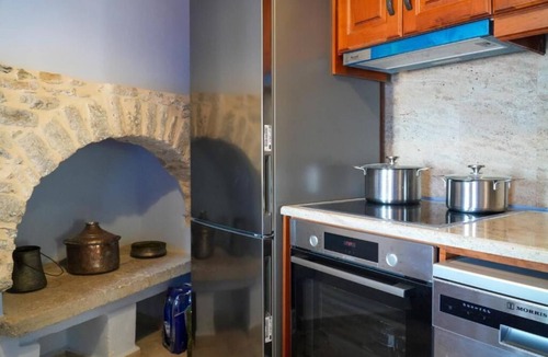 Symi Villa | Symi Uptown Indigo Villa-Indulge in a restored Symi villa and its secret garden