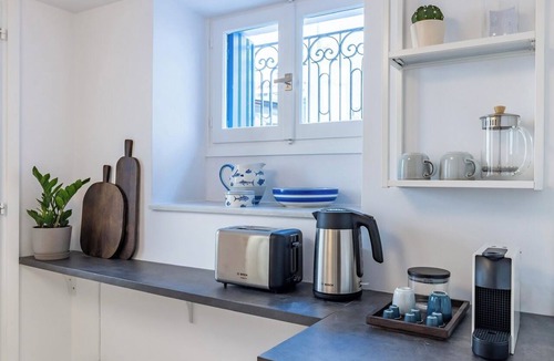 Skopelos House | The Blue Door – Elegant Neoclassical Townhouse in Skopelos Town