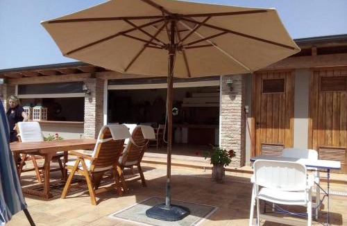 Mytikas Apartment | The Orange Grove Garden Room