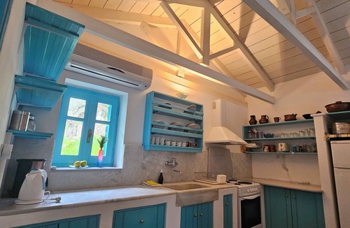 Egira House | Traditional stone house for 8 in a working olive grove — 2 hrs from Athens