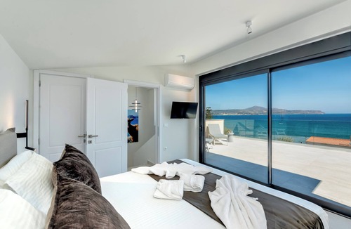 Kalyves Apartment | Villa Azurios - 2 Minute walk to the beach, with parking & lift access.