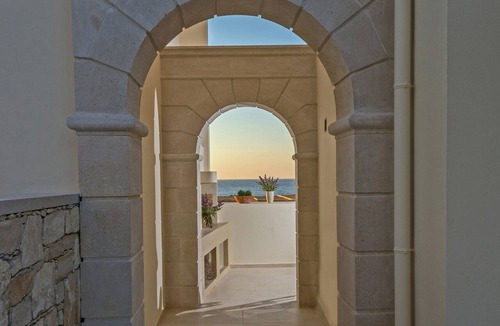 Panormos Villa | Villa Louisa by the sea,heated pool, walking distance from sea, no car needed!