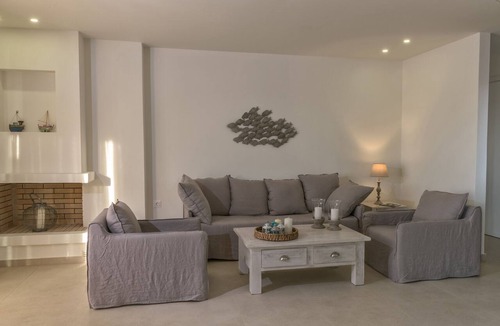 Panormos Villa | Villa Louisa by the sea,heated pool, walking distance from sea, no car needed!