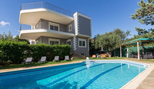 290m² Villa with Pool close to the Airport. in Athens Southern Suburbs