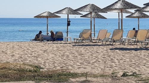 ammos seafront family apartments in Nea Plagia