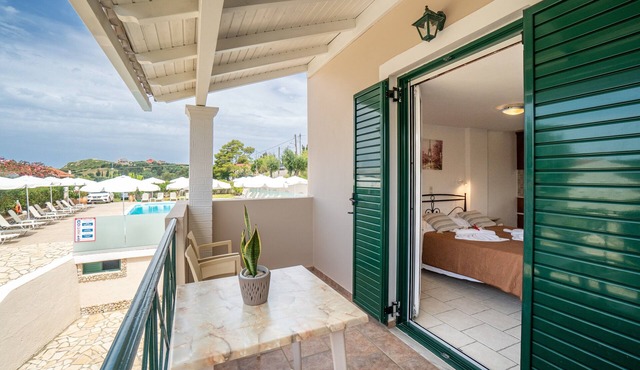Apartment 'Standard Studio Upstairs 11' with Shared Pool, Wi-Fi and Air Conditioning in arillas kerkyra