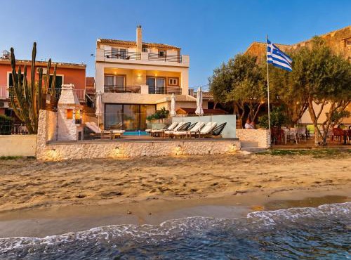 Beachfront Villa Anatoli Sidari with private heated pool by DadoVillas in Sidari