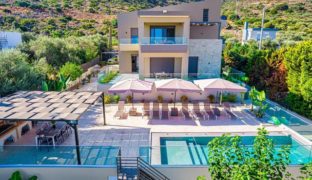 Chris and Stratos villa with private ecologic pool and kid's playground! in Mourniaí