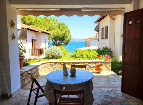 Eleni's Blue House by Kato Gatzea in Volos