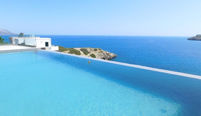 Luxury clifftop villa, veryprivate infinity pool, summer kitchen, and sea views. in Chania