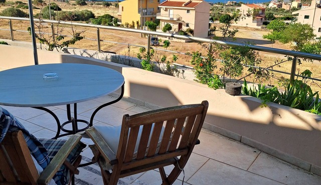 One-bedroom suite on the third floor with panoramic views,accessible by elevator in ΧΑΡΑΚΑΣ ΛΑΥΡΕΩΤΙΚΗΣ