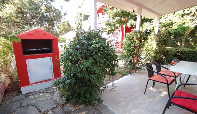 RED Wooden House near the sea in Beautiful Chalkidiki in Sozopoli