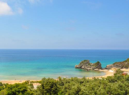 Studio Apartments with large swimming pool and Sea view at Pelekas Beach Corfu in Pelekas