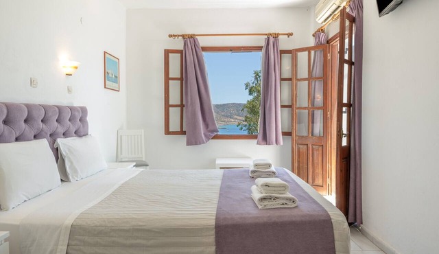 Superior Top Floor Sea View 2 Room with Private Balcony and Shared Pool in Lakki