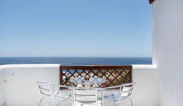 Superior Top Floor Sea View Room with Private Balcony and Shared Pool in Lakki
