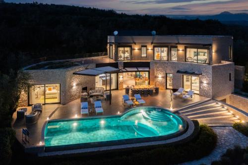 The Olive Retreat Villa pool treehouse sleeps 10 in Tragána