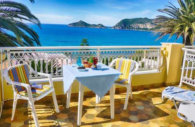Apartment for 2 people with a beautiful sea view just 50m from the beautiful sandy beach in Agios Georgios Pagi