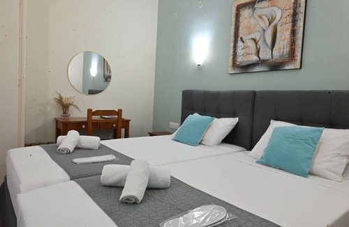 Benitses Hotel | Gina Studios