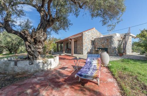 Galatas House | Stone house among trees