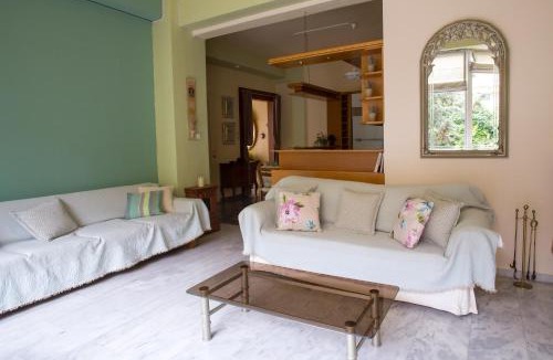 Argyroupoli Apartment | Charming Sunlit Apartment with Garden Views