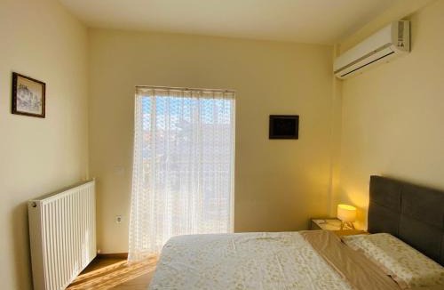Agia Paraskevi Apartment | Wonderful Garden #1, 120 sqm with a large terrace, 3 bedrooms, comfortable, quiet, and upscale neighborhood, close to the subway, free parking, 15 minutes direct to Athens Airport